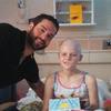 Susan with Brandon Bollig of the champion Chicago Blackhawks. He brought up the Stanley Cup to St Louis Children's Hospital so all the kids could see it! 